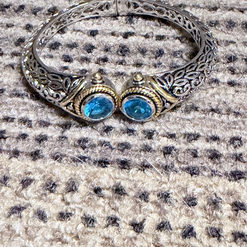 Elegant Silver and Gold Tone Bracelet Blue Accents Dec Birthstone Hinge Bangle - Picture 3 of 10